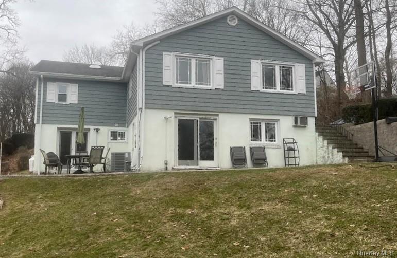 13 Summitt Place Valhalla, NY 10595 - Photo 1 of 10 a front view of a house with a yard