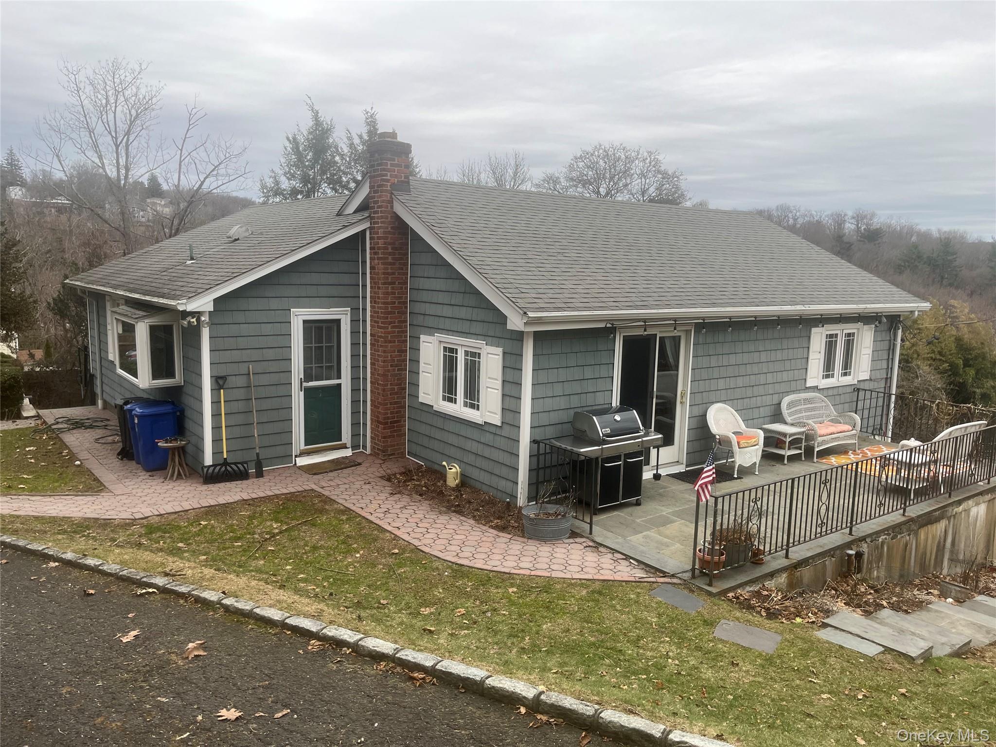 13 Summitt Place Valhalla, NY 10595 - Photo 2 of 10 a view of a house with a patio