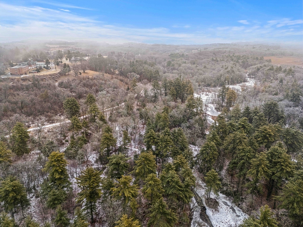 285 Central Street Rowley, MA 01969 - Photo 4 of 5 an aerial view of house with yard and mountain view in back