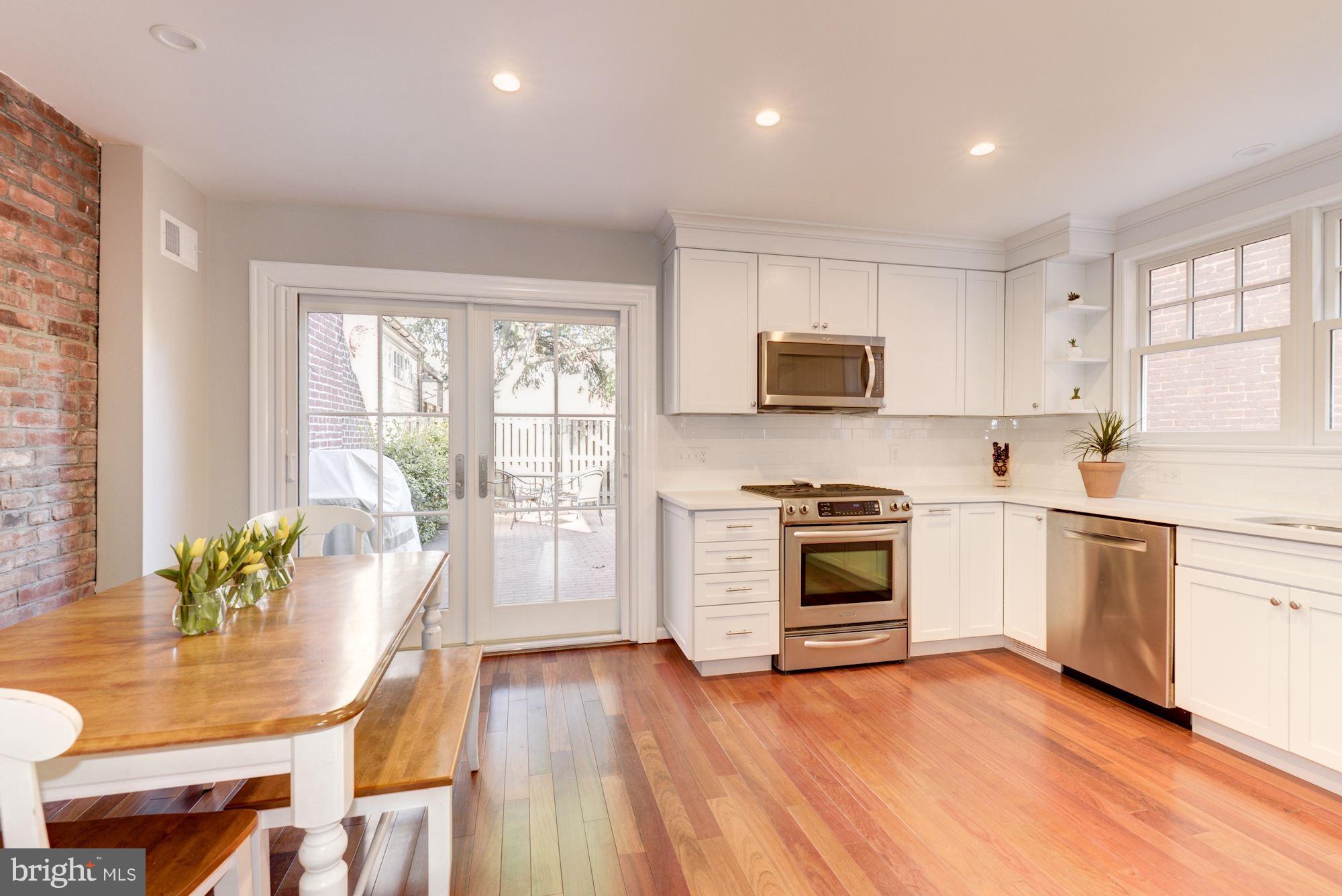 313 5th Street Northeast Washington, DC 20002 - Photo 11 of 26 Eat-in kitchen with exit to gracious patio.
