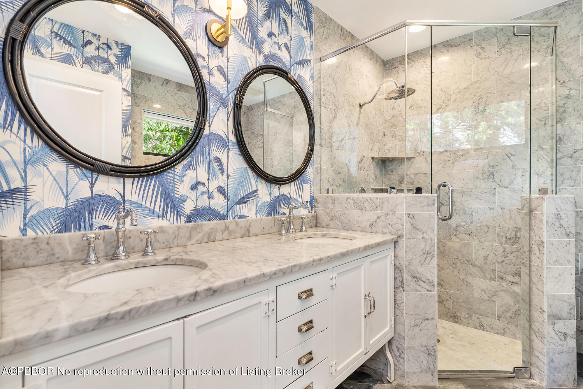 3210 Vincent Road West Palm Beach, FL 33405 - Photo 12 of 20 a bathroom with a granite countertop sink a mirror and a shower