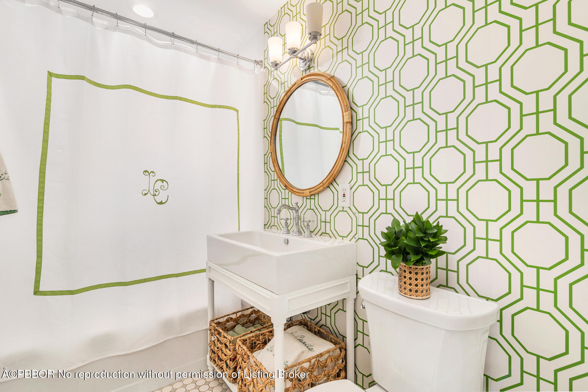 3210 Vincent Road West Palm Beach, FL 33405 - Photo 13 of 20 a bathroom with a sink and a mirror