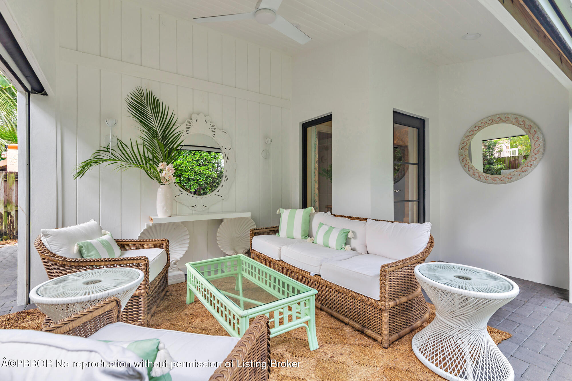 3210 Vincent Road West Palm Beach, FL 33405 - Photo 16 of 20 a living room with furniture and a lamp