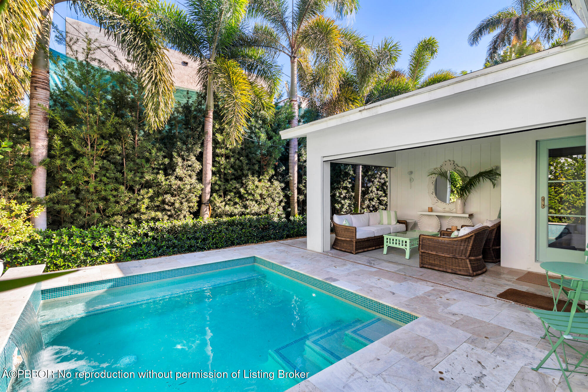 3210 Vincent Road West Palm Beach, FL 33405 - Photo 18 of 20 a backyard of a house with seating space