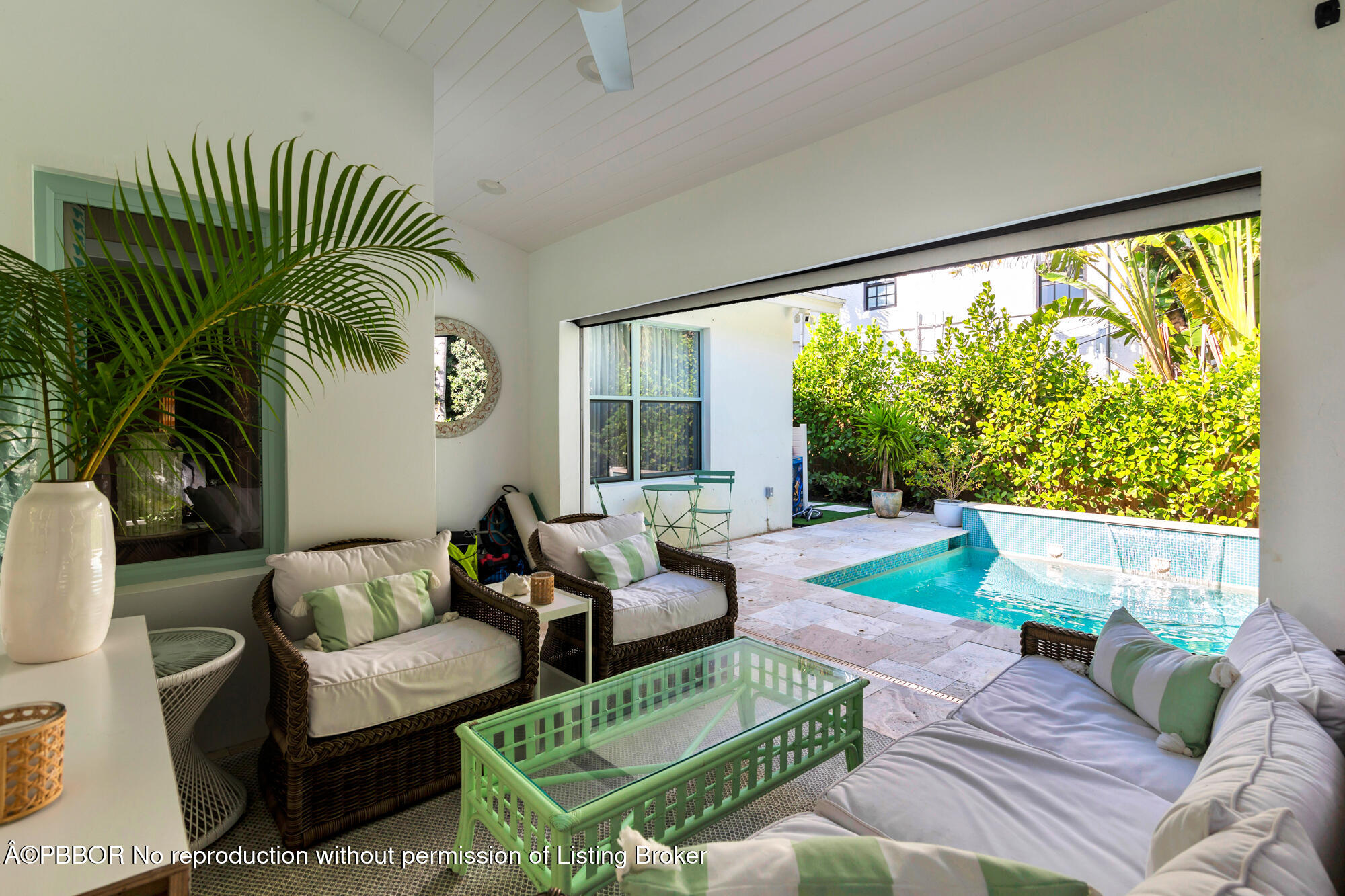 3210 Vincent Road West Palm Beach, FL 33405 - Photo 6 of 20 a living room with furniture and a large window