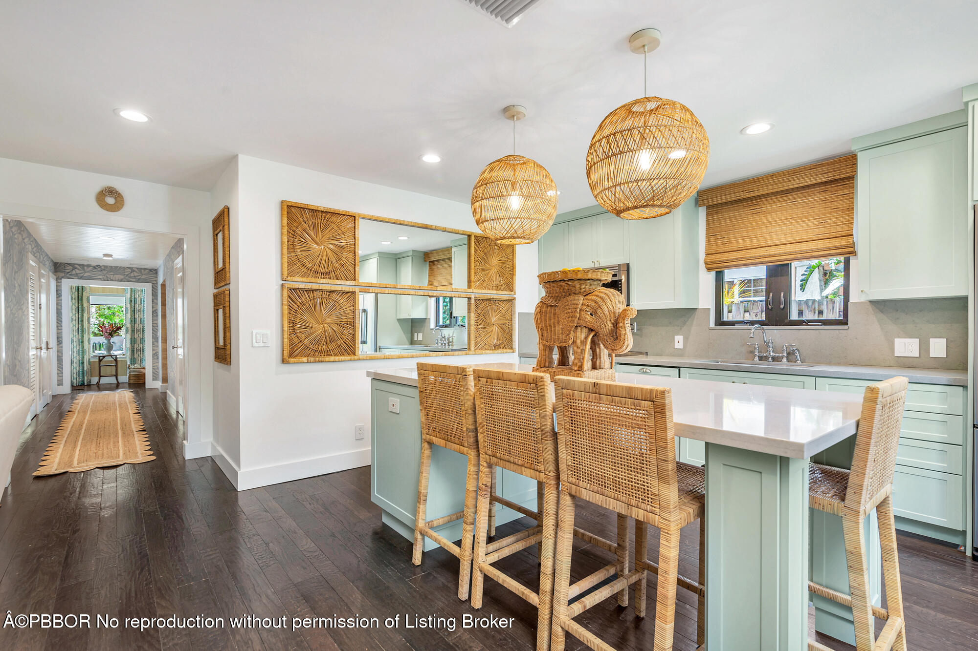 3210 Vincent Road West Palm Beach, FL 33405 - Photo 8 of 20 a room with wooden floors and glass windows
