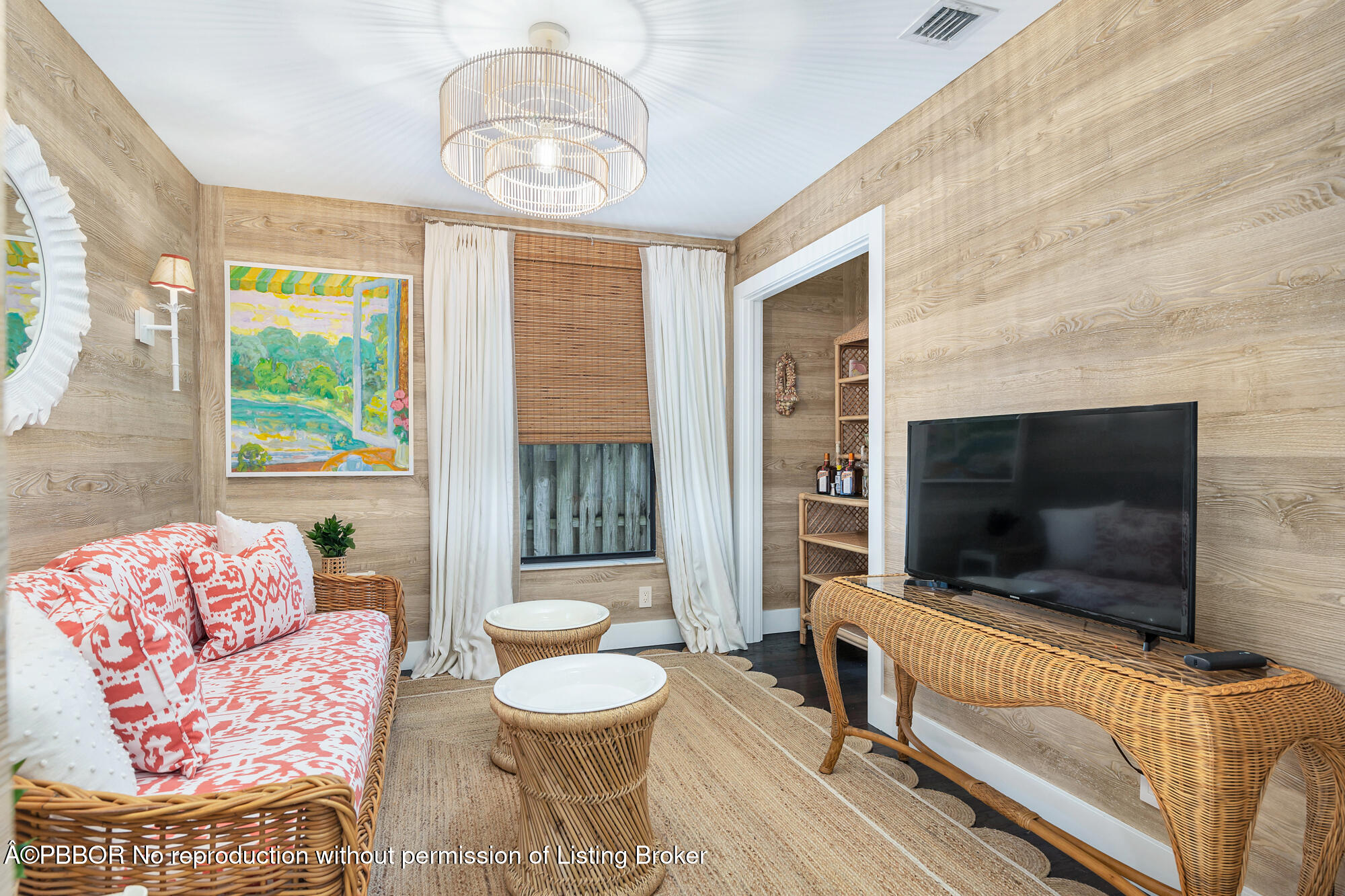 3210 Vincent Road West Palm Beach, FL 33405 - Photo 9 of 20 a living room with furniture and a flat screen tv