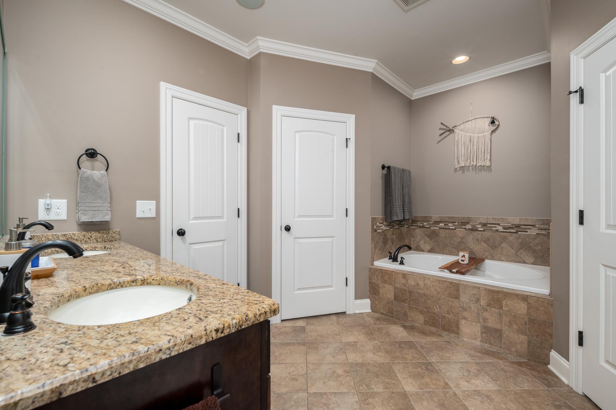 116 Rockingham Drive Murfreesboro, TN 37129 - Photo 17 of 40 a bathroom with a granite countertop tub sink and mirror