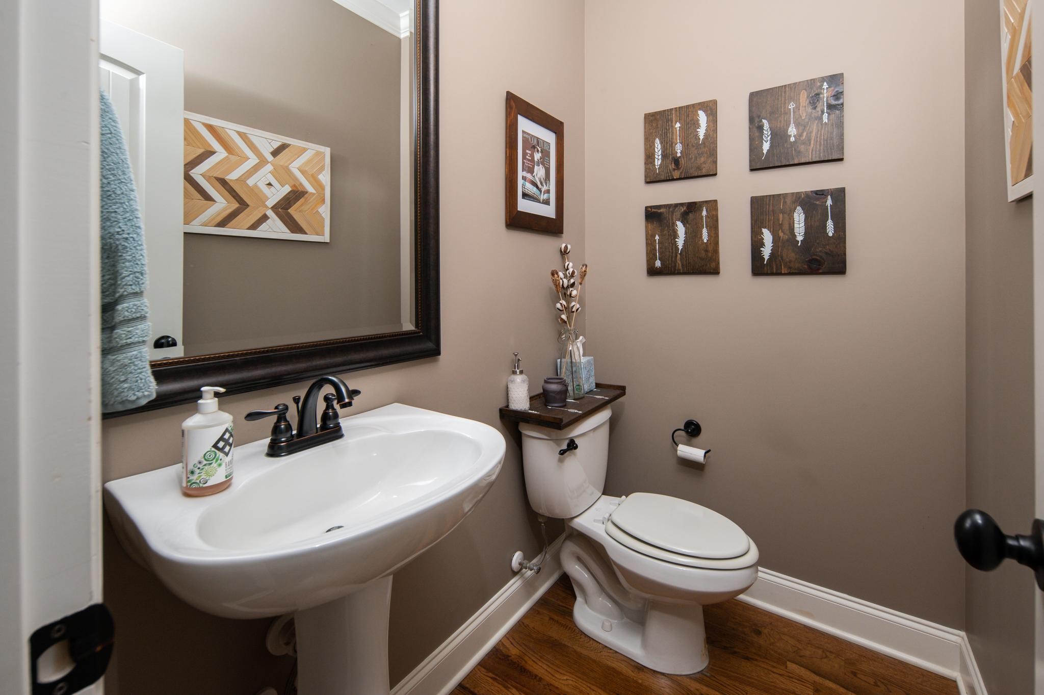 116 Rockingham Drive Murfreesboro, TN 37129 - Photo 6 of 40 a bathroom with a toilet sink and mirror