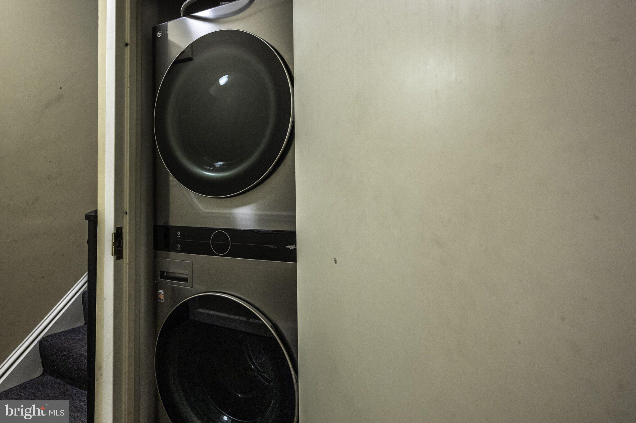 1426 21st Street Northwest, Unit 407 Washington, DC 20036 - Photo 26 of 58 a close up view of a washer and dryer
