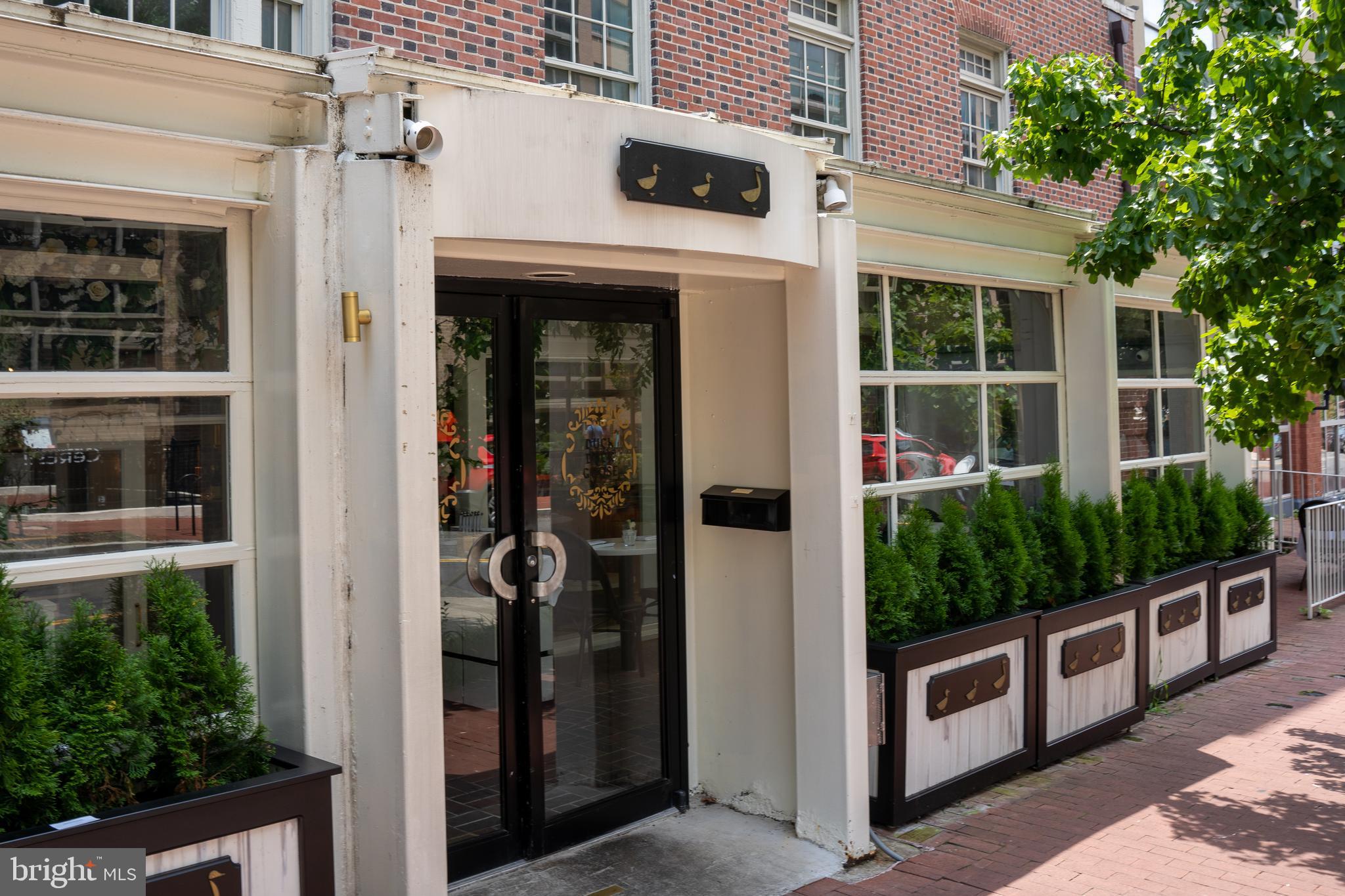 1426 21st Street Northwest, Unit 407 Washington, DC 20036 - Photo 45 of 58 front view of a house with a small porch