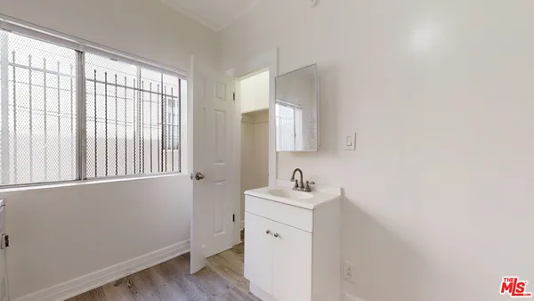 a view of bathroom with dual sinks