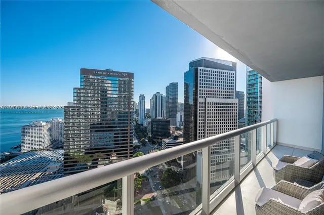 a view of a balcony with city view