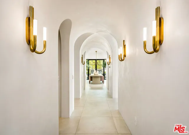 a view of a living space with a swimming pool