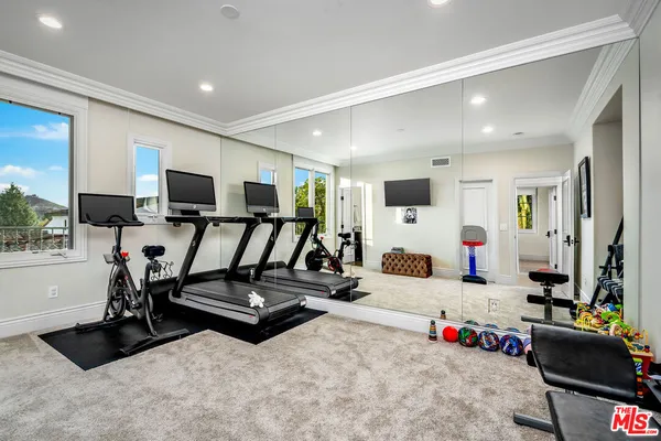 a view of a room with gym equipment