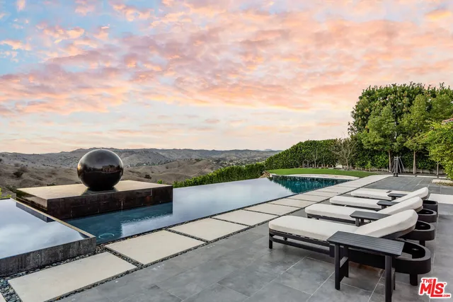a view of a terrace with sitting area