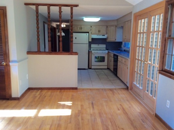 2 Bellows Road Wilbraham, MA 01095 - Photo 11 of 30 a view of a kitchen with cabinets and wooden floor