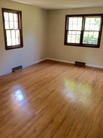 2 Bellows Road Wilbraham, MA 01095 - Photo 18 of 30 an empty room with wooden floor and windows