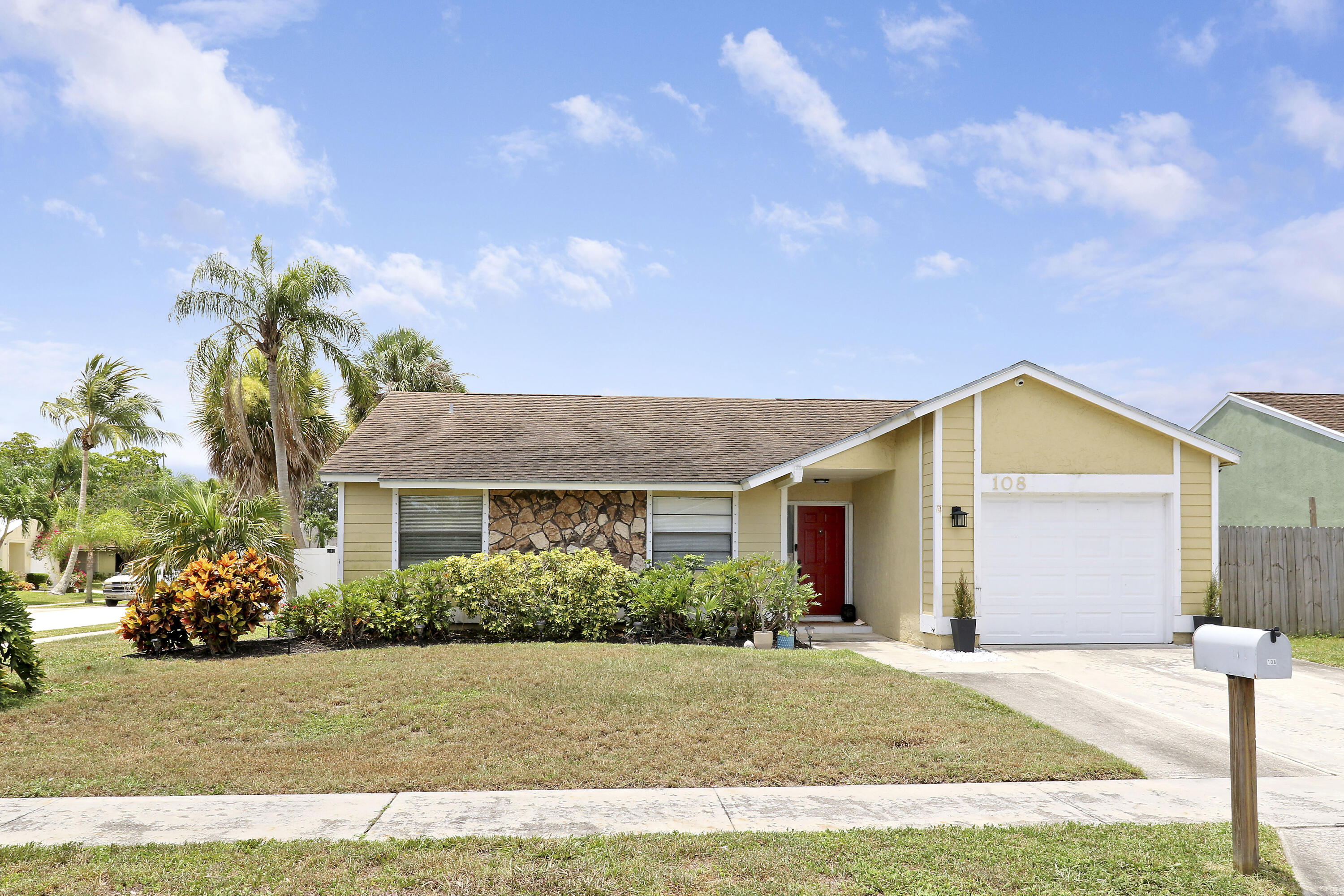 108 Greenbriar Drive Jupiter, FL 33458 - Photo 1 of 26 Front of Home