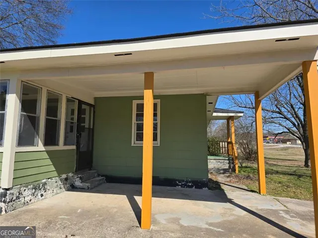 a view of entrance gate of the house