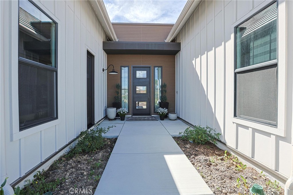 32213 Daybrook Terrace Temecula, CA 92591 - Photo 21 of 75 a view of a house with potted plants next to a road