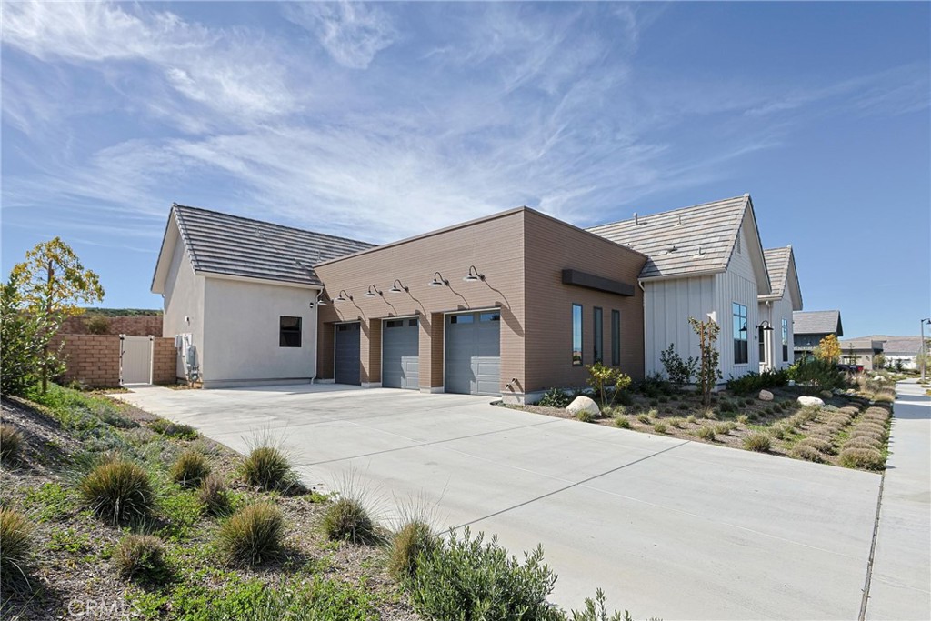 32213 Daybrook Terrace Temecula, CA 92591 - Photo 3 of 75 a front view of a house with a yard and garage