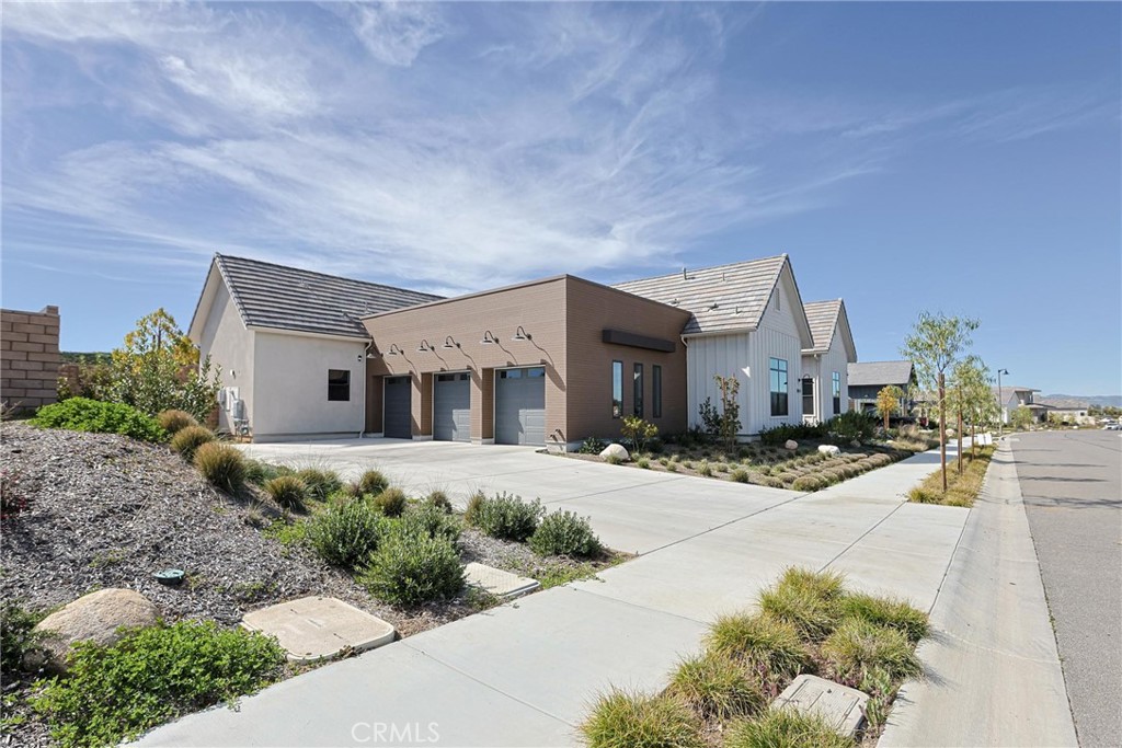 32213 Daybrook Terrace Temecula, CA 92591 - Photo 4 of 75 a front view of a house with a yard