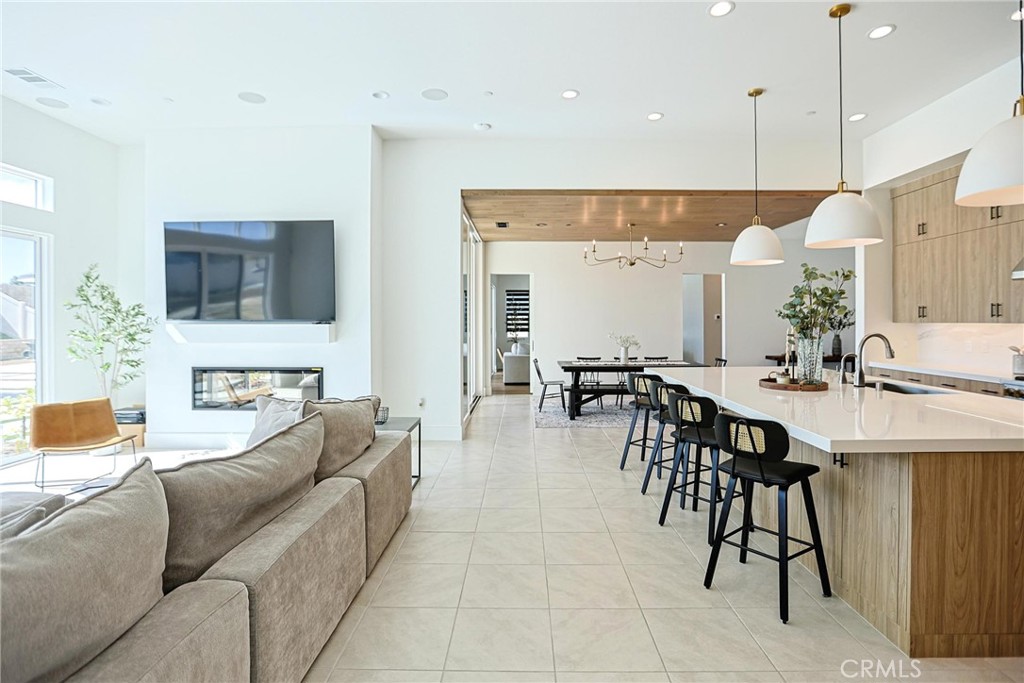 32213 Daybrook Terrace Temecula, CA 92591 - Photo 41 of 75 a living room with furniture a fireplace and a flat screen tv