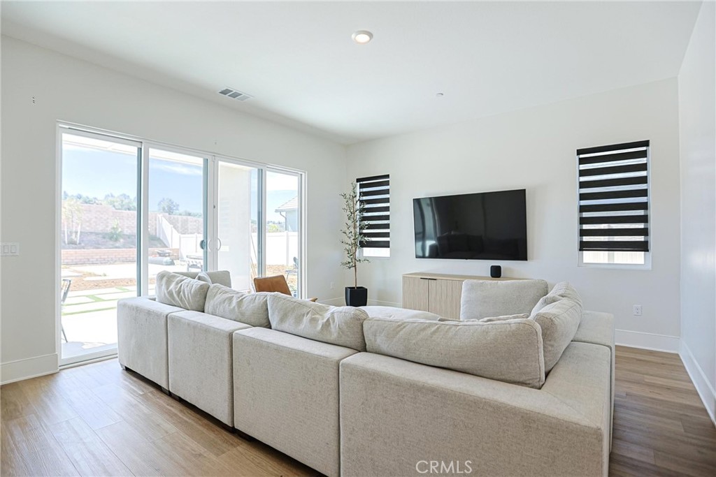 32213 Daybrook Terrace Temecula, CA 92591 - Photo 45 of 75 a living room with furniture and a flat screen tv