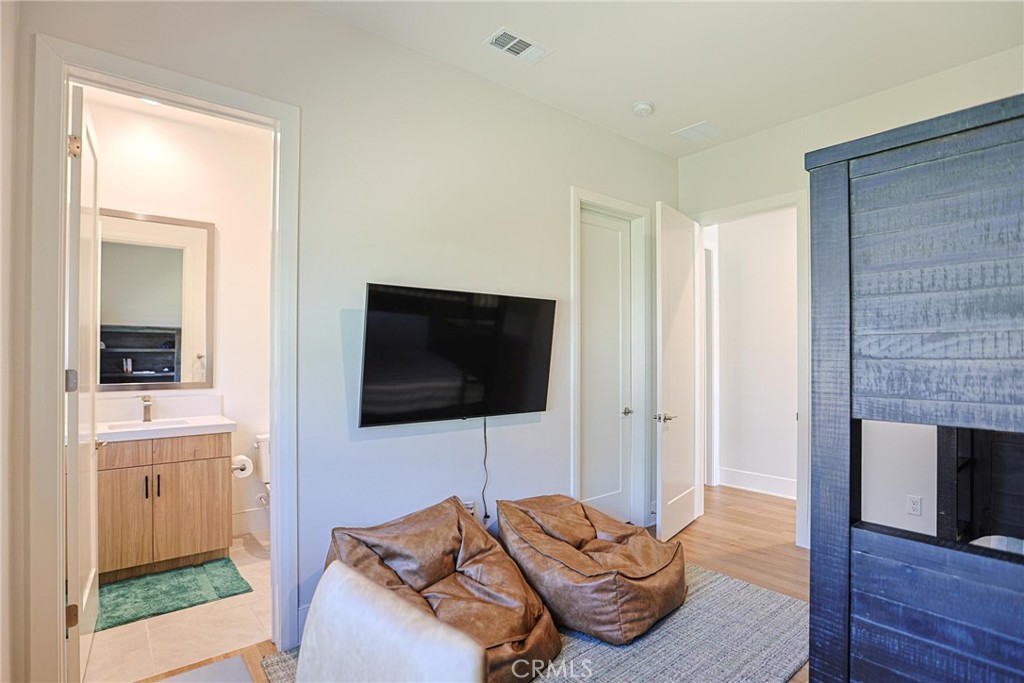 32213 Daybrook Terrace Temecula, CA 92591 - Photo 47 of 75 a living room with furniture and a flat screen tv
