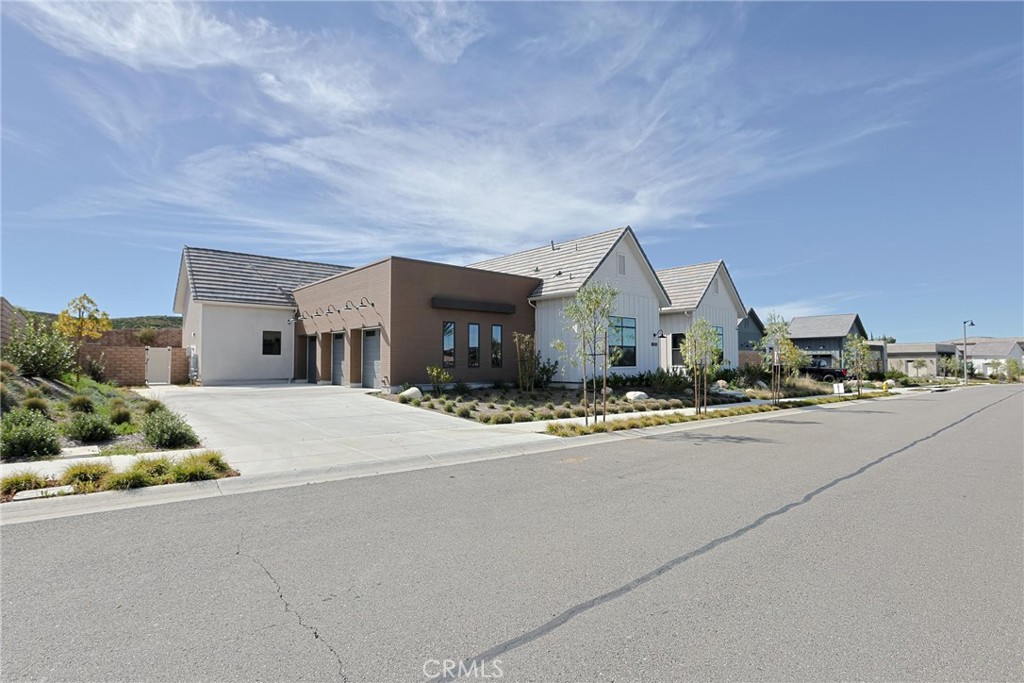 32213 Daybrook Terrace Temecula, CA 92591 - Photo 5 of 75 a front view of a house with a yard and garage