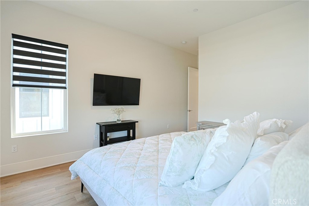 32213 Daybrook Terrace Temecula, CA 92591 - Photo 51 of 75 a bedroom with a bed and a flat screen tv