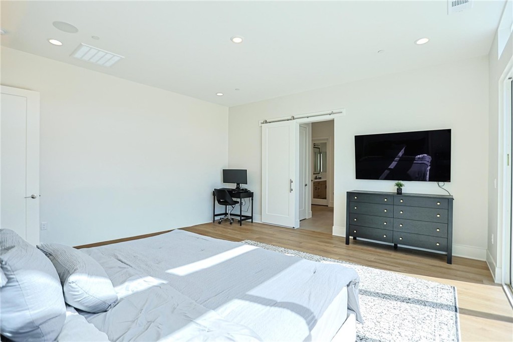 32213 Daybrook Terrace Temecula, CA 92591 - Photo 57 of 75 a bedroom with a bed and flat screen tv