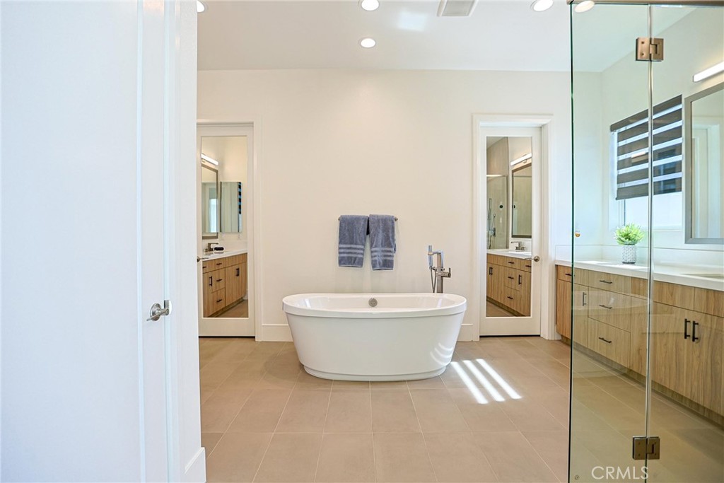 32213 Daybrook Terrace Temecula, CA 92591 - Photo 58 of 75 a spacious bathroom with a bathtub sink and toilet