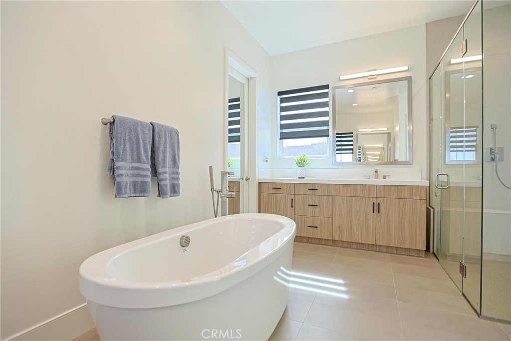 32213 Daybrook Terrace Temecula, CA 92591 - Photo 60 of 75 a bathroom with a bathtub and a sink