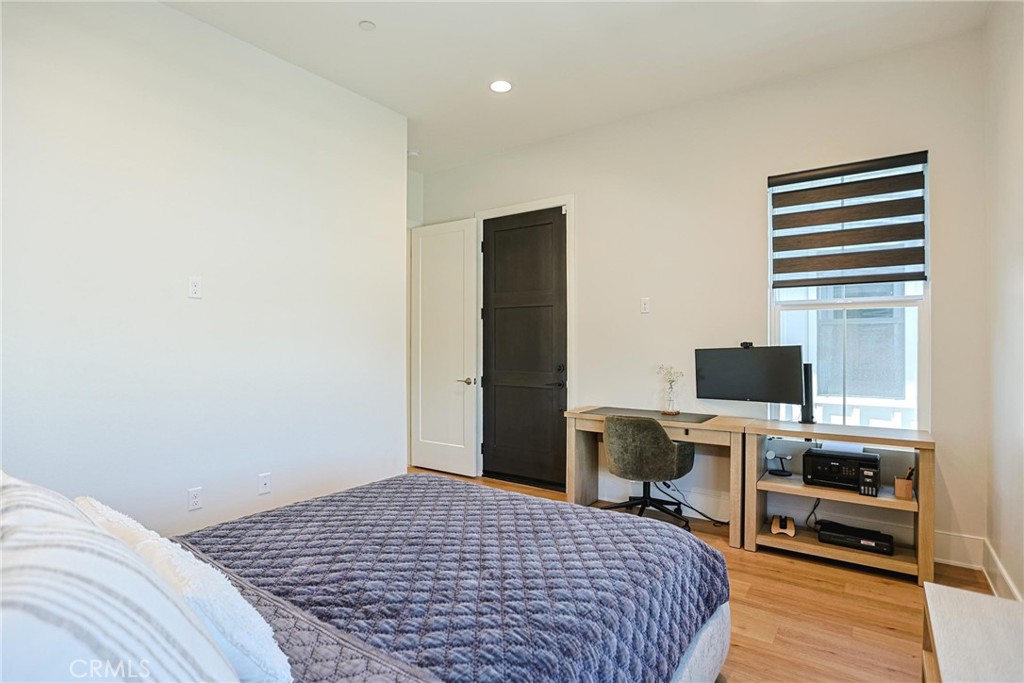 32213 Daybrook Terrace Temecula, CA 92591 - Photo 72 of 75 a bedroom with a bed and a flat screen tv