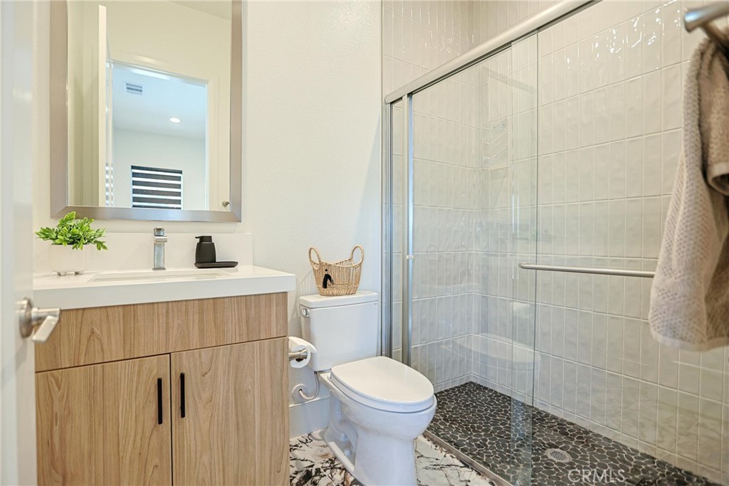32213 Daybrook Terrace Temecula, CA 92591 - Photo 73 of 75 a bathroom with a sink toilet and shower