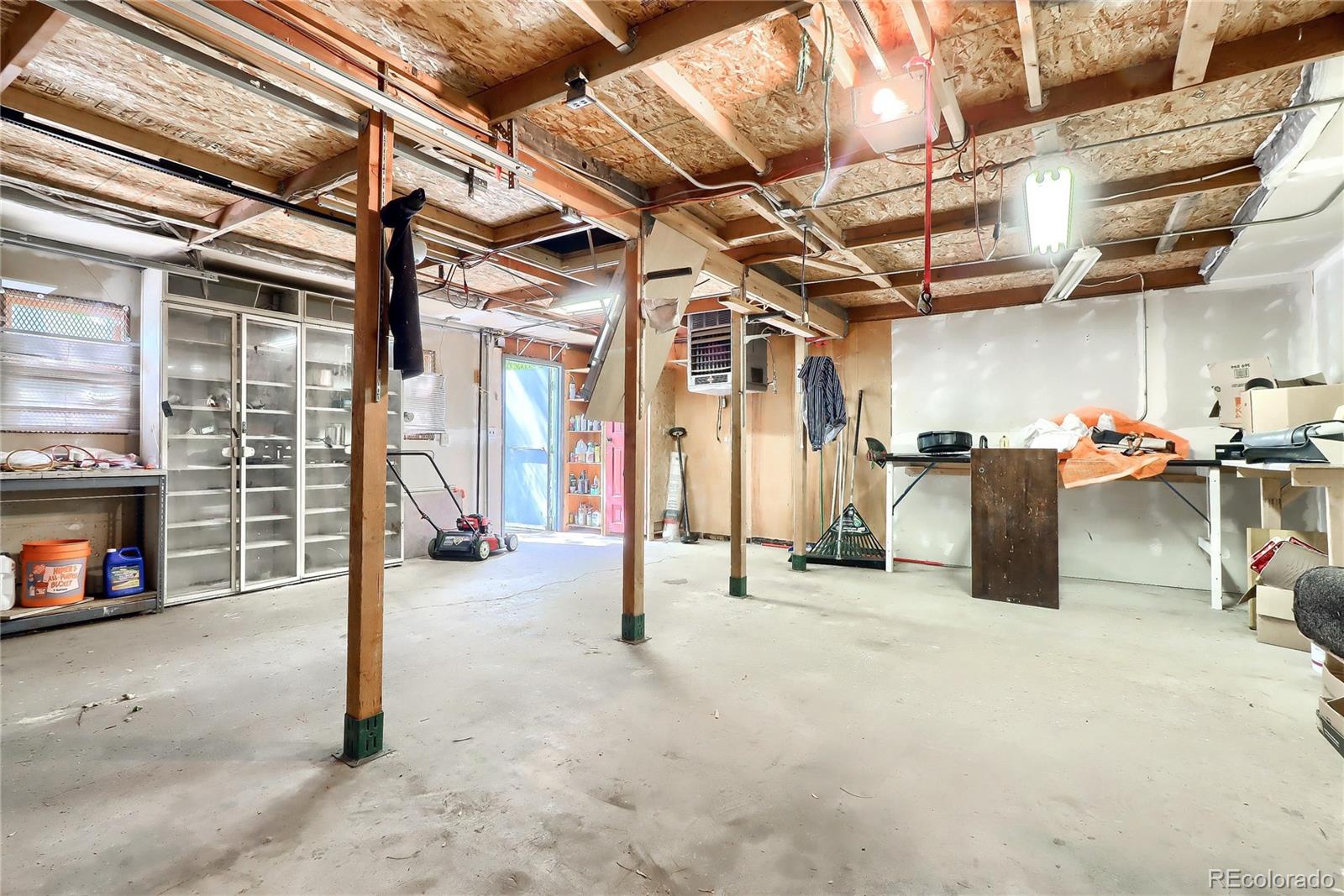 6201 East Tennessee Avenue Denver, CO 80224 - Photo 25 of 25 a view of a garage with storage