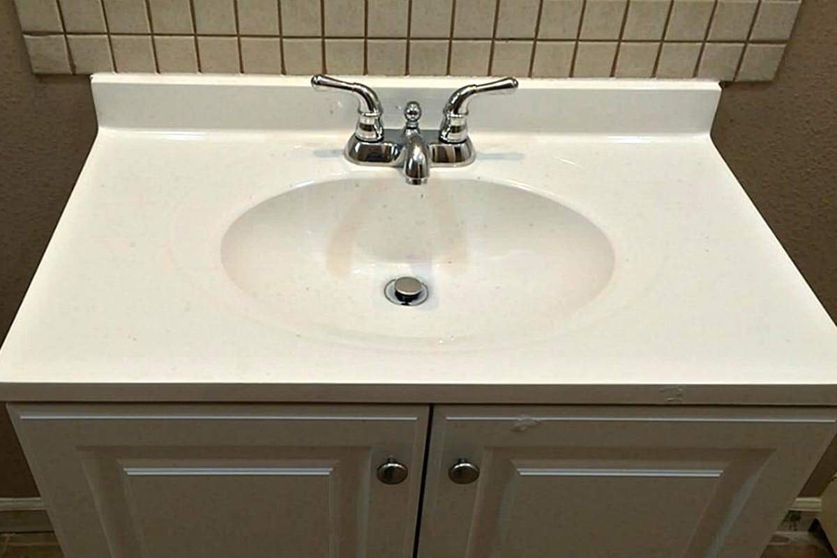 5103 Yellowstone Boulevard Houston, TX 77021 - Photo 6 of 10 a close view of a faucet with a sink