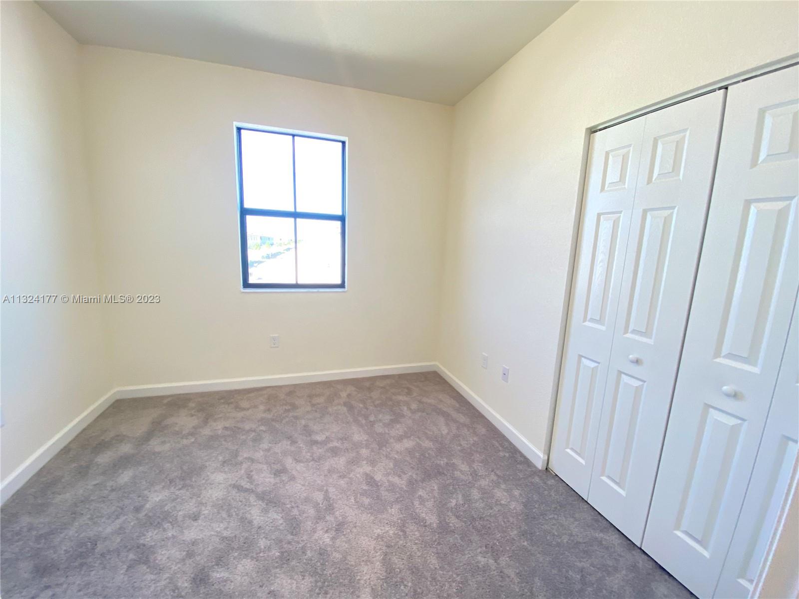 Hialeah Hialeah, FL 33018 - Photo 13 of 30 an empty room with a window