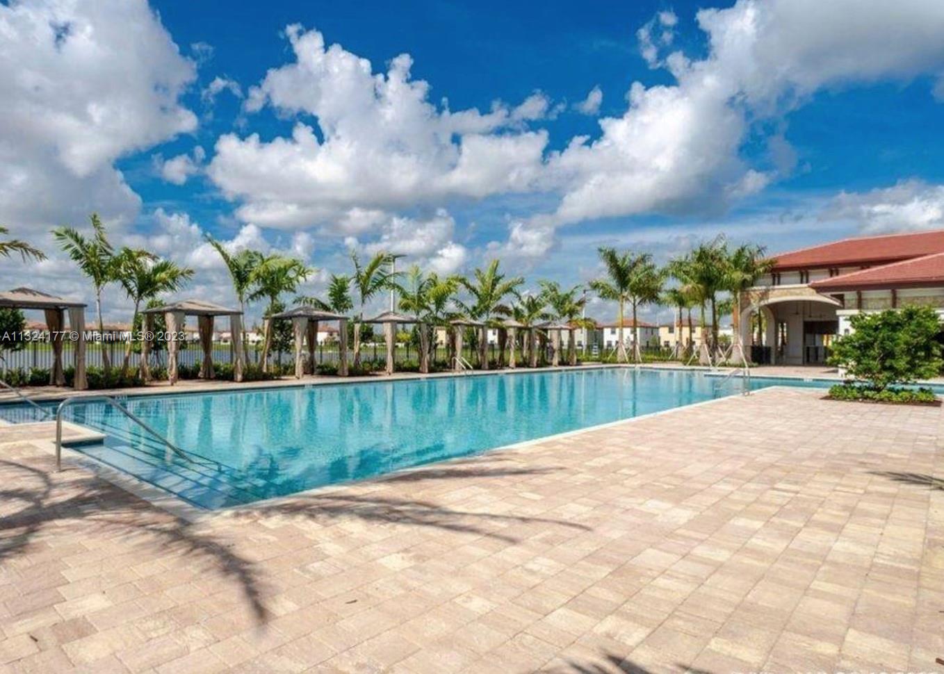 Hialeah Hialeah, FL 33018 - Photo 20 of 30 a view of a fountain in front of a house