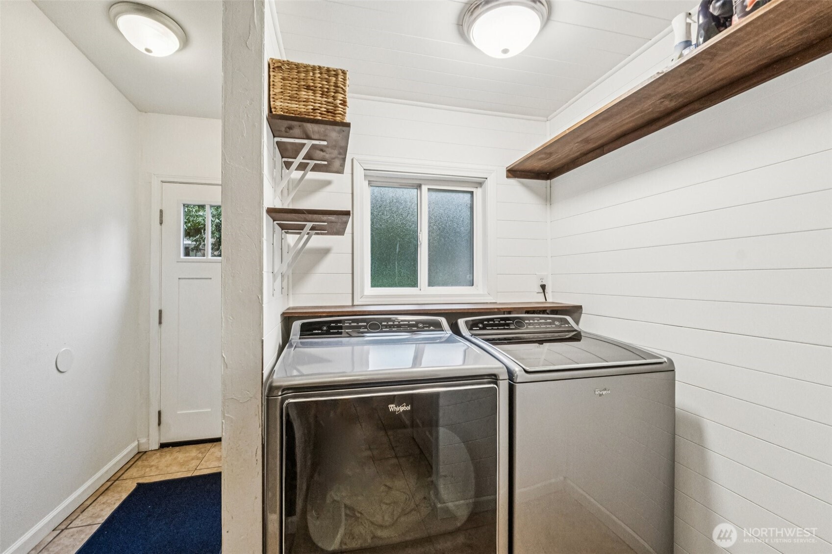 23716 Locust Way Bothell, WA 98021 - Photo 18 of 26 a utility room with dryer and washer