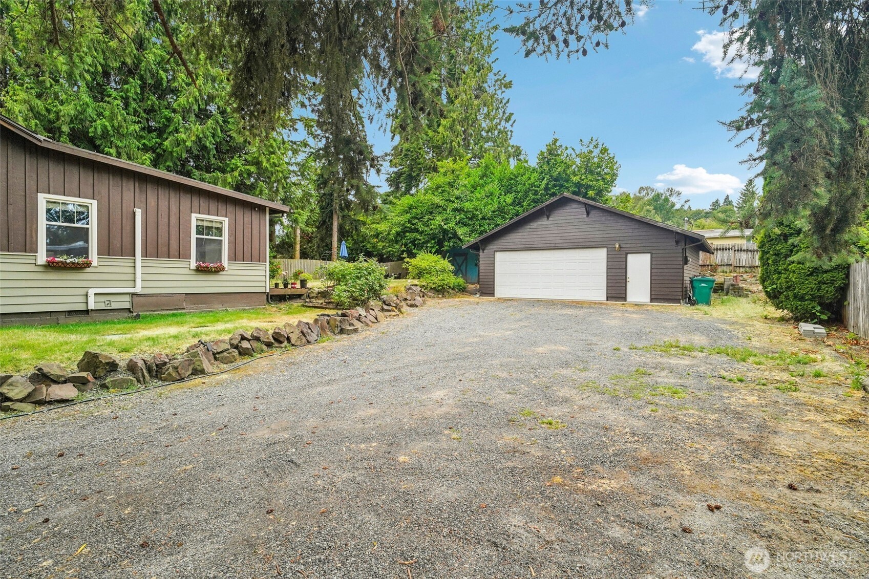 23716 Locust Way Bothell, WA 98021 - Photo 2 of 26 a view of a house with a yard