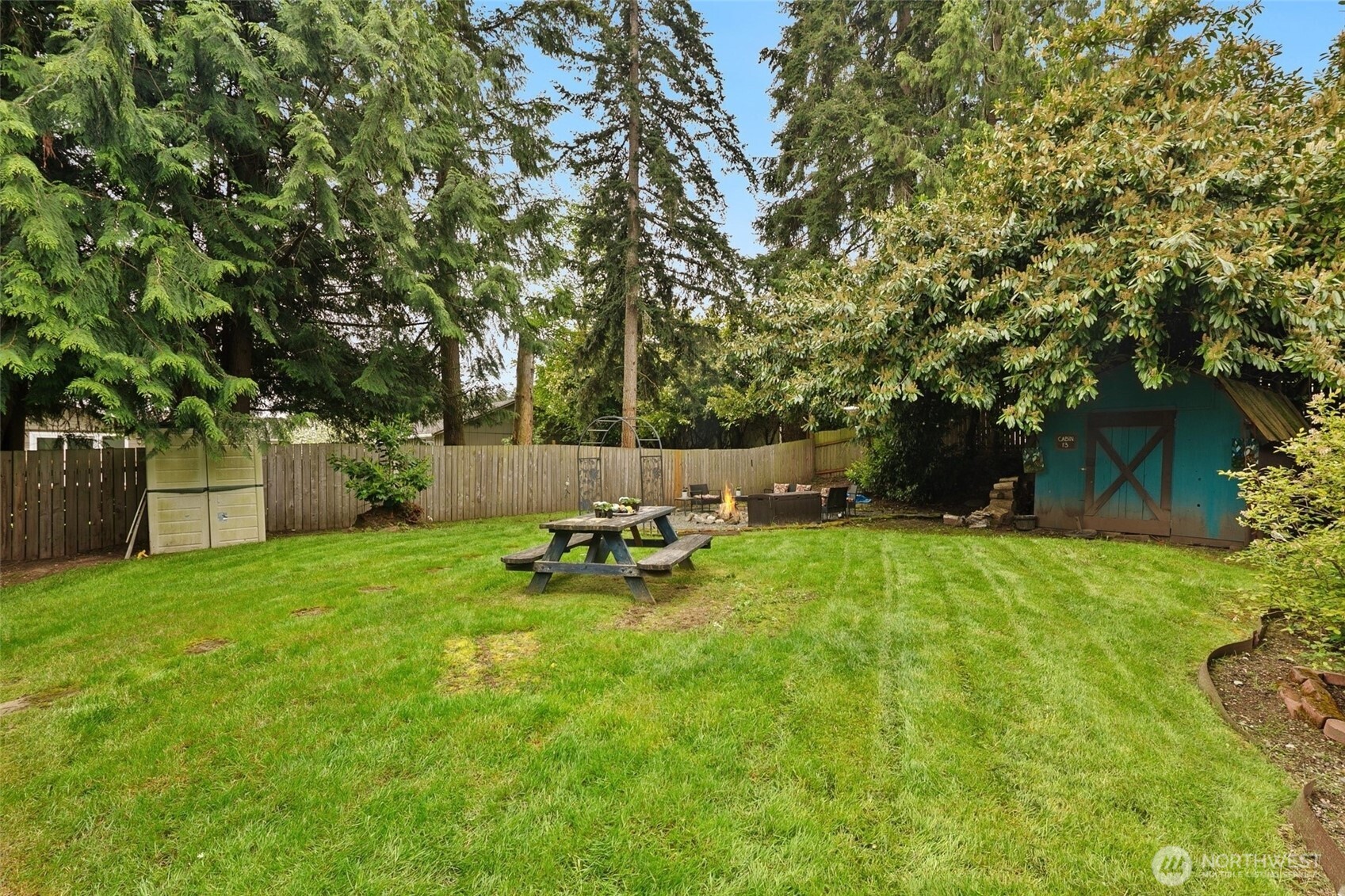 23716 Locust Way Bothell, WA 98021 - Photo 21 of 26 a view of a backyard with swimming pool