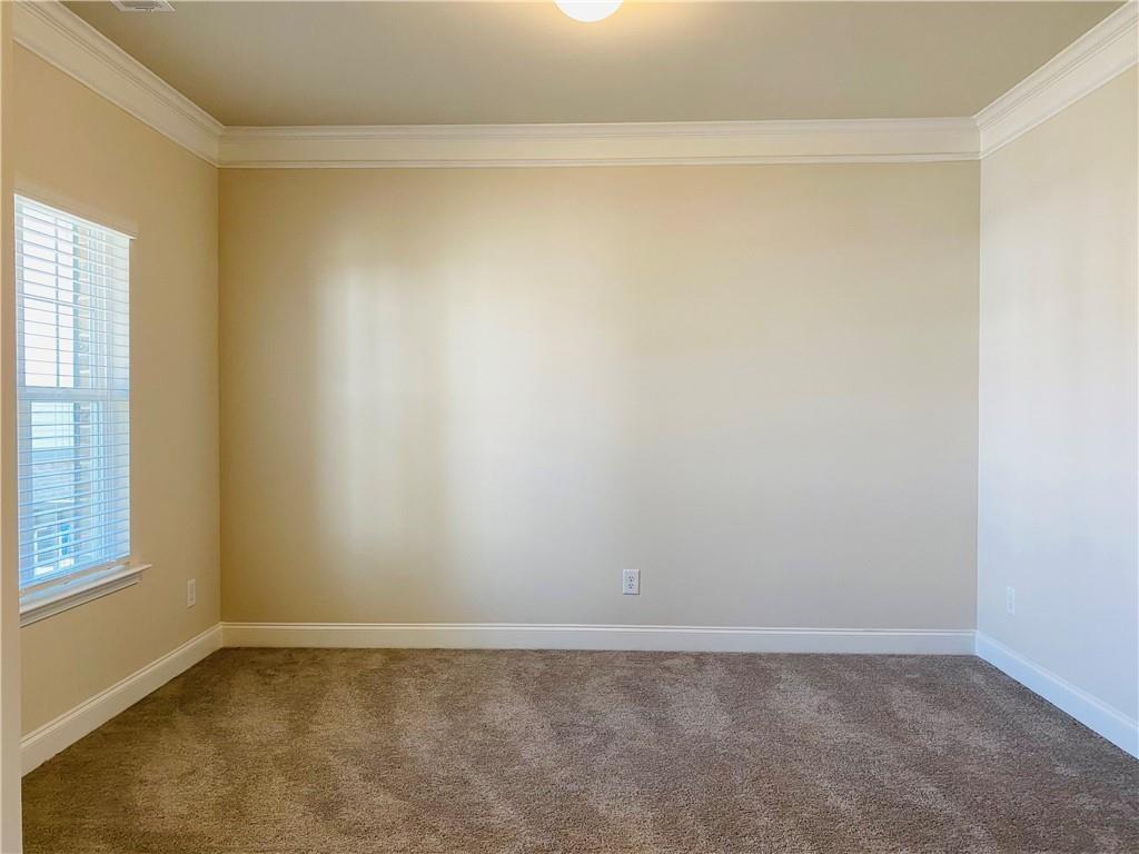 5101 Woodline View Circle Auburn, GA 30011 - Photo 8 of 26 a view of an empty room and window
