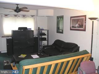97 Country Club Road Pine Hill, NJ 08021 - Photo 3 of 6 a bedroom with a bed and dresser