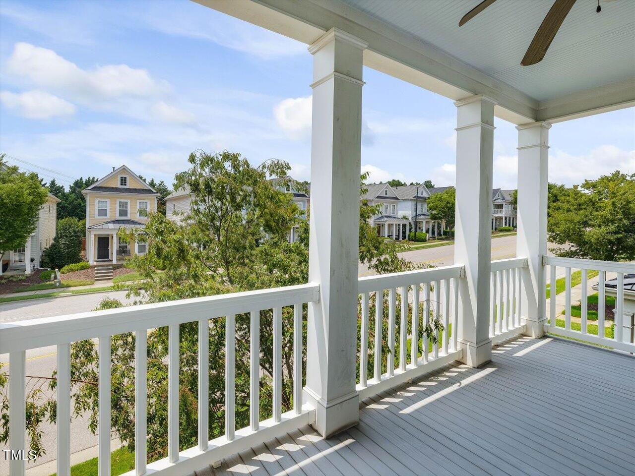 7712 ACC Boulevard Raleigh, NC 27617 - Photo 21 of 38 a view of a balcony with wooden floor