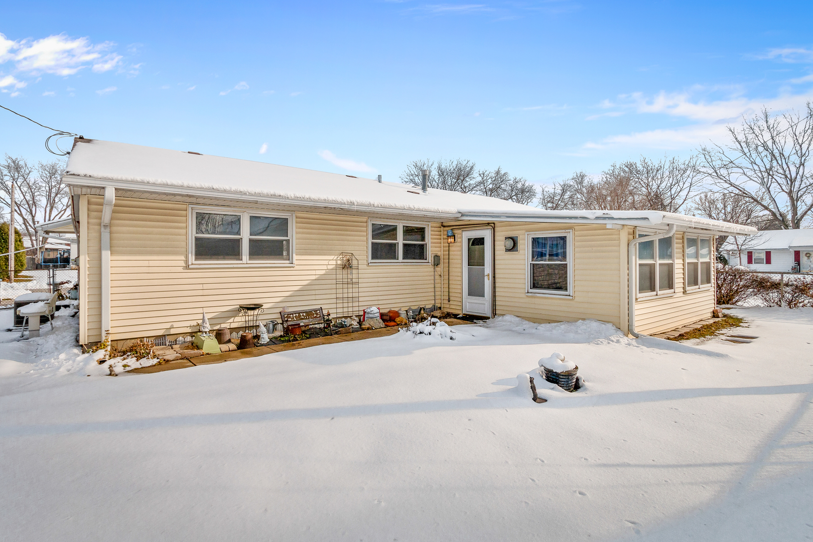 1240 Post Road Aurora, IL 60506 - Photo 15 of 15 a front view of house with yard outdoor seating and barbeque oven