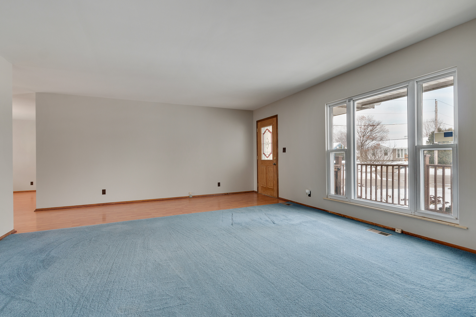 1240 Post Road Aurora, IL 60506 - Photo 4 of 15 a view of an empty room with a window