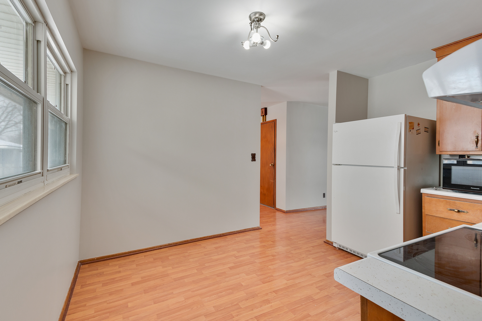 1240 Post Road Aurora, IL 60506 - Photo 7 of 15 a view of a kitchen with a refrigerator a sink and dishwasher